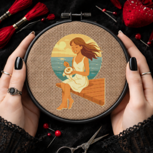 A girl embroidering against the backdrop of the sea - Cross stitch pattern PDF